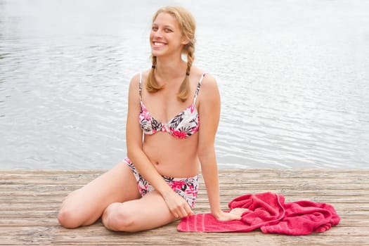 Young woman at the bathing lake