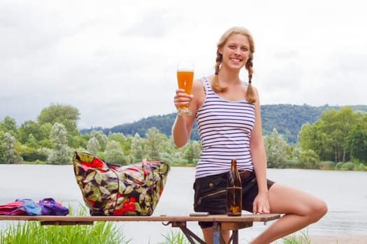 Young woman with yeast szweit in her hand