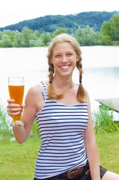 Young woman with yeast szweit in her hand