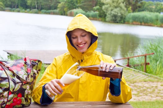 Drinking beer in the rain