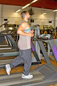 Man in the studio on the treadmill