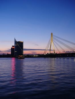 View of Riga river and Vansu Bridge in evening