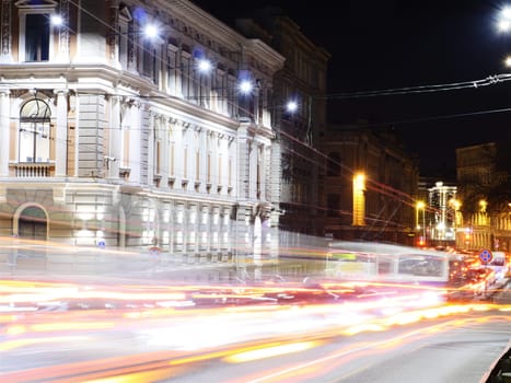 NIght viw of Historic bulding and light trails