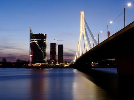 View of Riga river and Vansu Bridge in evening