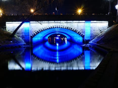 night view of small bridge in center of Riga