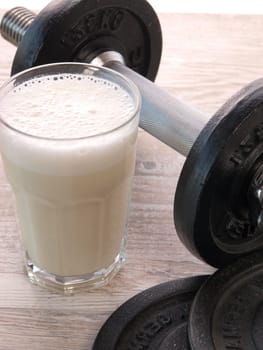 Fitness shake with dumbbells