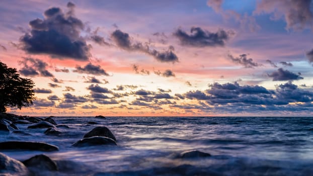 Beautiful landscape of sky and clouds above the sea during sunset at Khao Lak Beach in Khao Lak-Lam Ru National Park, Takuapa, Phang Nga province, Thailand, wide screen 16