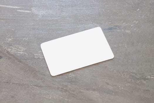 Name card on grey background, stock photo