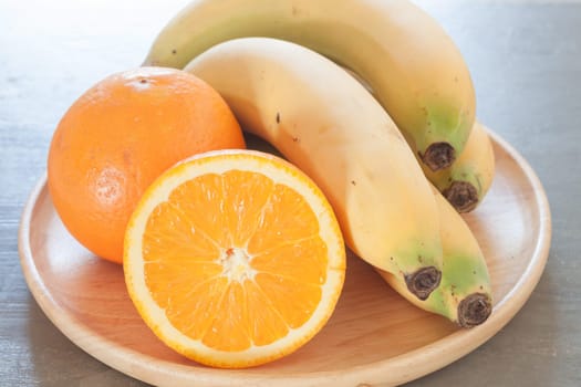 Healthy fruits with oranges and bananas, stock photo