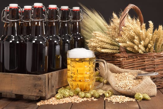 Beer box and beer glass with wheat,barley,hops and malt