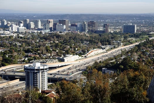 Los Angeles,United States - December 27,2015: The Skyline of the City of Los Angeles with various skyscrapers behind the San Diego Freeway on December 27,2015 in Los Angeles.