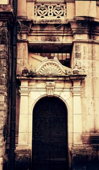 Metalic gate with with iron ornaments, Enter to a oldgothic church