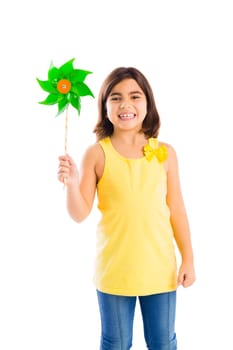 Beautiful girl blowing a plastic windmill