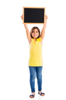 Young girl holding a chalkboard, isolated on white