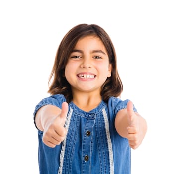 Studio portrait of a beautiful girl smiling, isolated over white background