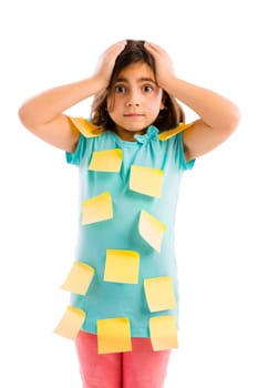 Stressed young girl with yellow notes sticked all over the body