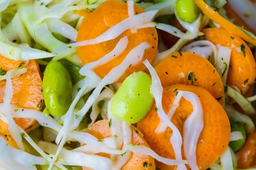 Coleslaw salad with carrots, healthy meal. closeup