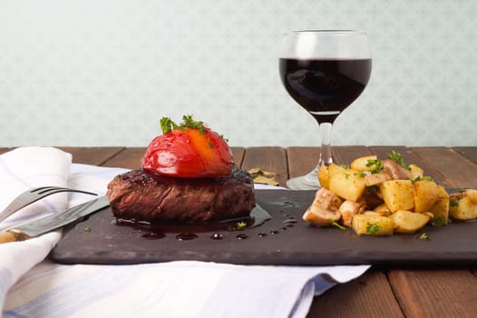 Sirloin steak with roasted potatoes and mushrooms