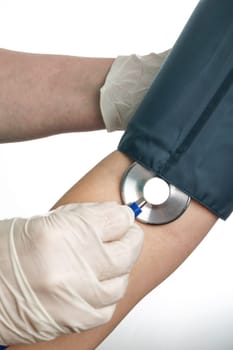 blood pressure measurement on the upper arm. Stethoscope