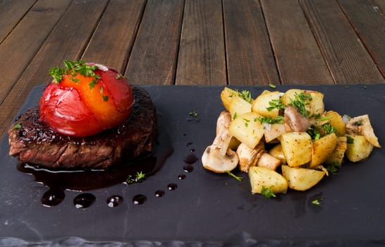 Sirloin steak with roasted potatoes and mushrooms