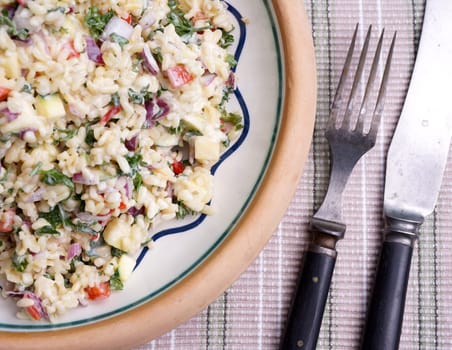 Tabouleh in bowl on table. Middel eastern sidedish