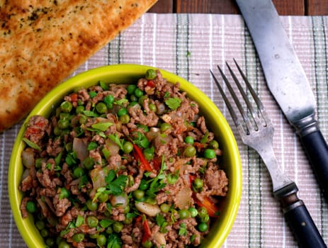 Kheema with naan bread. Indian dinner with bread