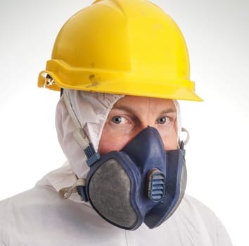Man in protective suit, helmet and a respiraton