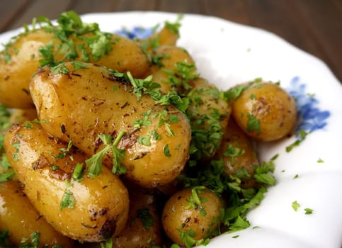 Roasted potatoes. Healthy sidedish with parsley garnish