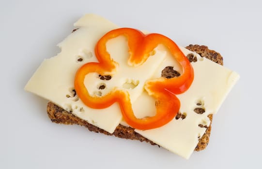 wholemeal rye bread with cheese and bellpeppers