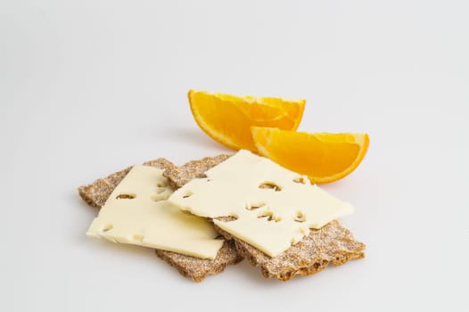 Crispy rye bread with cheese and orange