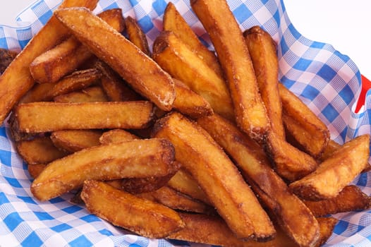 French Fries, isolated on white served in red basket