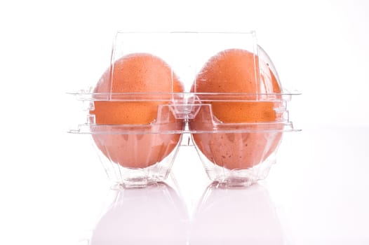 Egg tray with four egg isolated on white