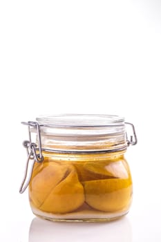 Preserved and Pickled lemon isolated on white