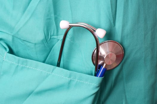 Doctor or Surgeon with stethoscope in pocket