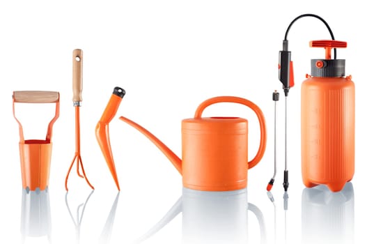 Four gardening tools and one pressure sprayer