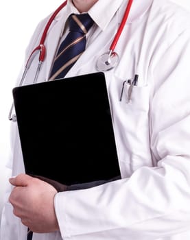 Male doctor is using a digital tablet in his work. The Digital Hospital, with new and modern resources and easy access to the important information about the patients, test results and patient registration