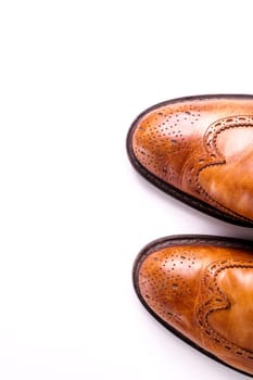 Elegant gentleman Leather Shoe. Brown elegant men's shoes ready to use for a gentleman rendezvous or business meeting. Isolated on white