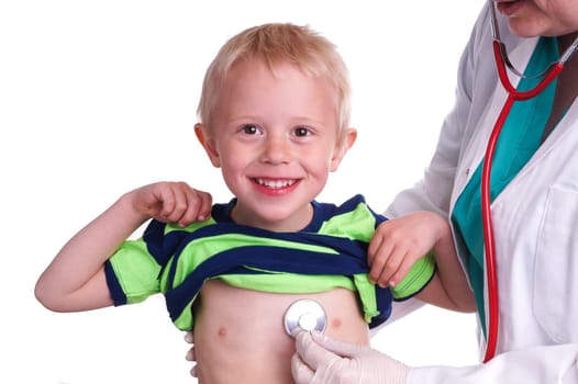 Doctor examines a young child. The doctor examines the child and listening to the heart and lungs with her stethoscope. He helps doctor by lift his shirt up so the nurse can come to listen to the boy's chest