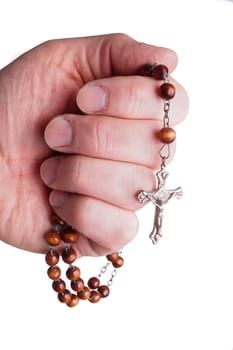 Hands of a woman Praying with Rosary, isoalted on white
