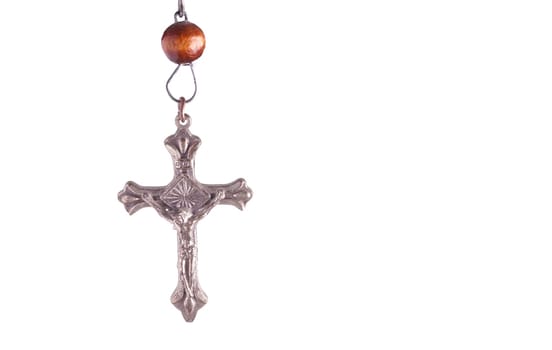 Wooden Rosary Beads and Cross, hanging. Isolated on White