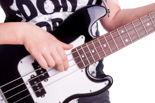 Hands of an female teenager plays guitar, Isolated on white