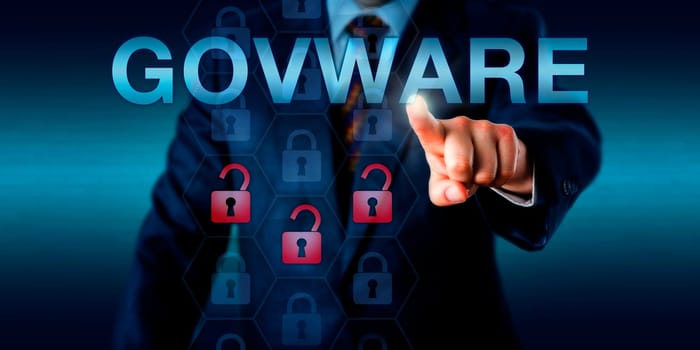 Government executive is touching GOVWARE onscreen. Three unlocked padlock icons embedded within a hexagonal structure do signify an intercepted communications matrix on a target computer.
