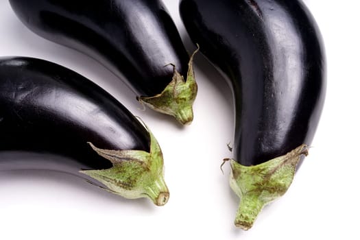 Three Healthy Organic Purple Eggplant, isolated on white
