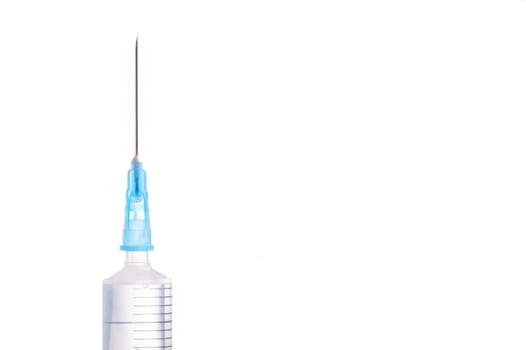 Syringe and needle filled with liquid, isolated on white