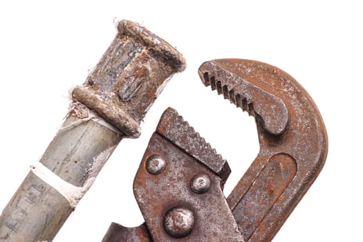 plumbing tools lying with old pipes and faucets