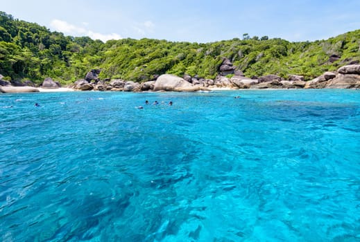 Tourists enjoyed snorkelling on blue sea and sky during summer at Ko Ba Ngu Island in Mu Ko Similan National Park, Phang Nga province, Thailand