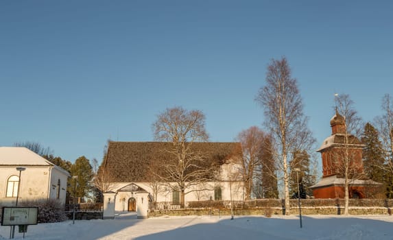 The Church in Nordmaling, Sweden in Winter time with a clear blue sky.