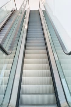 Pair of Escalators looking up.