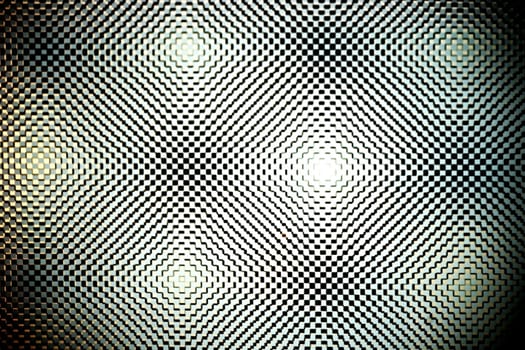 An abstract lyritoled metal surface of geometric shapes and figures.