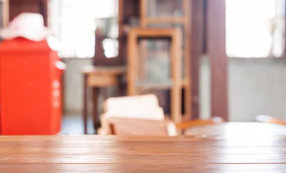Empty wooden table in coffee shop, stock photo